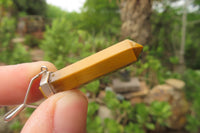 Polished Golden Tigers Eye Crystal Point set in Sterling Silver Pendant - sold per item - From South Africa