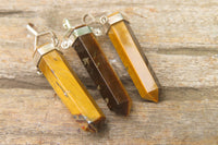 Polished Golden Tigers Eye Crystal Point set in Sterling Silver Pendant - sold per item - From South Africa