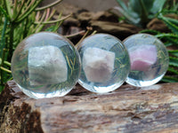 Polished Large Watermelon Fluorite cobbed piece in PVC Resin Sphere - sold per item - From Namibia