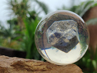 Polished Large Sodalite cobbed piece in PVC Resin Sphere - sold per item - From Namibia