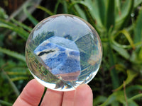 Polished Large Sodalite cobbed piece in PVC Resin Sphere - sold per item - From Namibia