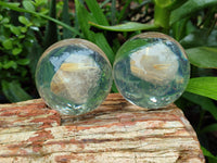 Polished Golden Rutile Quartz in PVC Resin Spheres - sold per item - From Brazil