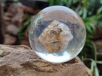 Polished Golden Rutile Quartz in PVC Resin Spheres - sold per item - From Brazil