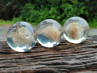 Polished Golden Rutile Quartz in PVC Resin Spheres - sold per item - From Brazil