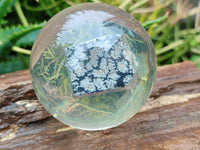 Polished Snowflake Obsidian pieces in PVC Resin Spheres - sold per item - From Mexico