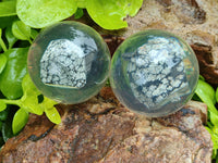 Polished Snowflake Obsidian pieces in PVC Resin Spheres - sold per item - From Mexico