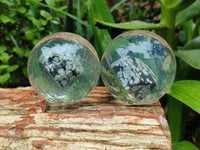 Polished Snowflake Obsidian pieces in PVC Resin Spheres - sold per item - From Mexico