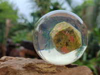 Polished Pink and Green Unakite cobbed piece in PVC Resin Sphere - sold per item - From South Africa