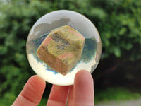 Polished Pink and Green Unakite cobbed piece in PVC Resin Sphere - sold per item - From South Africa