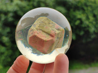 Polished Pink and Green Unakite cobbed piece in PVC Resin Sphere - sold per item - From South Africa