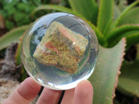 Polished Pink and Green Unakite cobbed piece in PVC Resin Sphere - sold per item - From South Africa