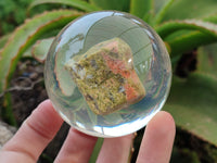 Polished Pink and Green Unakite cobbed piece in PVC Resin Sphere - sold per item - From South Africa