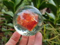 Polished Carnelian Agate in PVC Resin Spheres - sold per item - From Madagascar