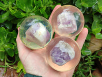 Polished Chevron Amethyst cobbed pieces in PVC Resin Spheres - sold per item - From Zambia