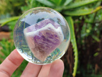 Polished Chevron Amethyst cobbed pieces in PVC Resin Spheres - sold per item - From Zambia