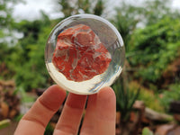 Polished  Brecciated Red Jasper cobbed piece in PVC Resin Sphere - sold per item - From Northern Cape, South Africa