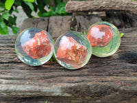 Polished  Brecciated Red Jasper cobbed piece in PVC Resin Sphere - sold per item - From Northern Cape, South Africa