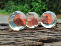 Polished  Brecciated Red Jasper cobbed piece in PVC Resin Sphere - sold per item - From Northern Cape, South Africa