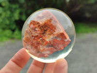 Polished  Brecciated Red Jasper cobbed piece in PVC Resin Sphere - sold per item - From Northern Cape, South Africa