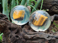 Polished Tigers Eye cobbed piece in PVC Resin Sphere - sold per item - From Northern Cape, South Africa