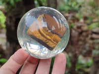 Polished Tigers Eye cobbed piece in PVC Resin Sphere - sold per item - From Northern Cape, South Africa