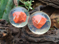 Polished Red Jasper cobbed piece in PVC Resin Sphere - sold per item - From South Africa