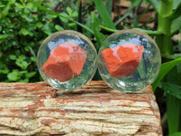 Polished Red Jasper cobbed piece in PVC Resin Sphere - sold per item - From South Africa