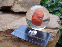 Polished Red Jasper cobbed piece in PVC Resin Sphere - sold per item - From South Africa