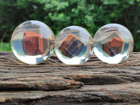 Polished Tiger Iron Jasper in PVC Resin Spheres - sold per item - From Australia