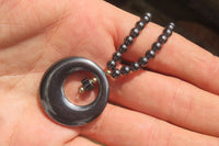 Polished Hematite Beaded Necklace with Donut Moon Pendant - Sold Per Item - From Southern Africa