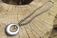 Polished Hematite Beaded Necklace with Donut Moon Pendant - Sold Per Item - From Southern Africa