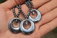 Polished Hematite Beaded Necklace with Donut Moon Pendant - Sold Per Item - From Southern Africa