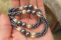 Polished Hematite and Freshwater Pearl Twisted Beaded Necklace - Sold Per Item - From Southern Africa