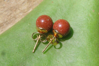 Polished Pair of Copper Sunstone Stud Earrings - sold per Pair - From India