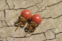 Polished Pair of Copper Sunstone Stud Earrings - sold per Pair - From India