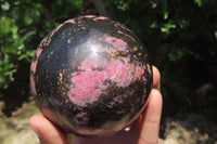 Polished Rhodonite Sphere x 1 From Madagascar