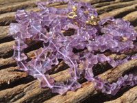 Polished Amethyst Fancy Star Shaped Beaded Necklace - Sold per Item- From Zambia