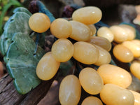 Polished Honey Aragonite Hanging Bunch of Grapes with Green Fuchsite Leaves - sold per item - From Namibia