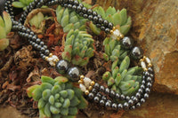 Polished Silver Hematite and Freshwater Pearl Triple Twisted Beaded Necklace - Sold Per Item - From China