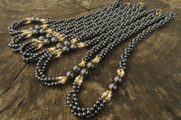 Polished Silver Hematite and Freshwater Pearl Triple Twisted Beaded Necklace - Sold Per Item - From China