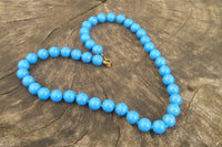 Polished Blue Turquenite Howlite Ball Shaped Bead Necklace - Sold Per Item - From Zimbabwe