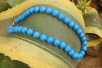 Polished Blue Turquenite Howlite Ball Shaped Bead Necklace - Sold Per Item - From Zimbabwe