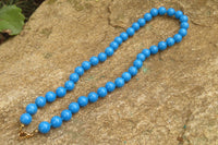 Polished Blue Turquenite Howlite Ball Shaped Bead Necklace - Sold Per Item - From Zimbabwe