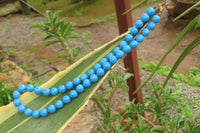 Polished Blue Turquenite Howlite Ball Shaped Bead Necklace - Sold Per Item - From Zimbabwe