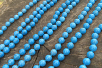 Polished Long Blue Turquenite Howlite Ball Shaped Bead Necklace - Sold Per Item - From Zimbabwe