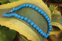 Polished Long Blue Turquenite Howlite Ball Shaped Bead Necklace - Sold Per Item - From Zimbabwe