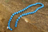 Polished Long Blue Turquenite Howlite Ball Shaped Bead Necklace - Sold Per Item - From Zimbabwe