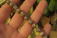 Polished Snakeskin Rhyolite Jasper Faceted Bead Necklace - sold per Pair - From Australia