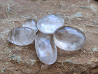 Polished Clear Quartz Palm Stones x 24 From Madagascar