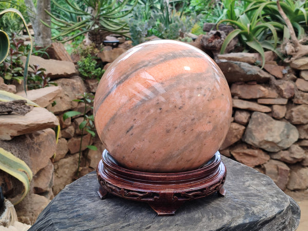 Polished Orange Twist Calcite Sphere x 1 From Madagascar